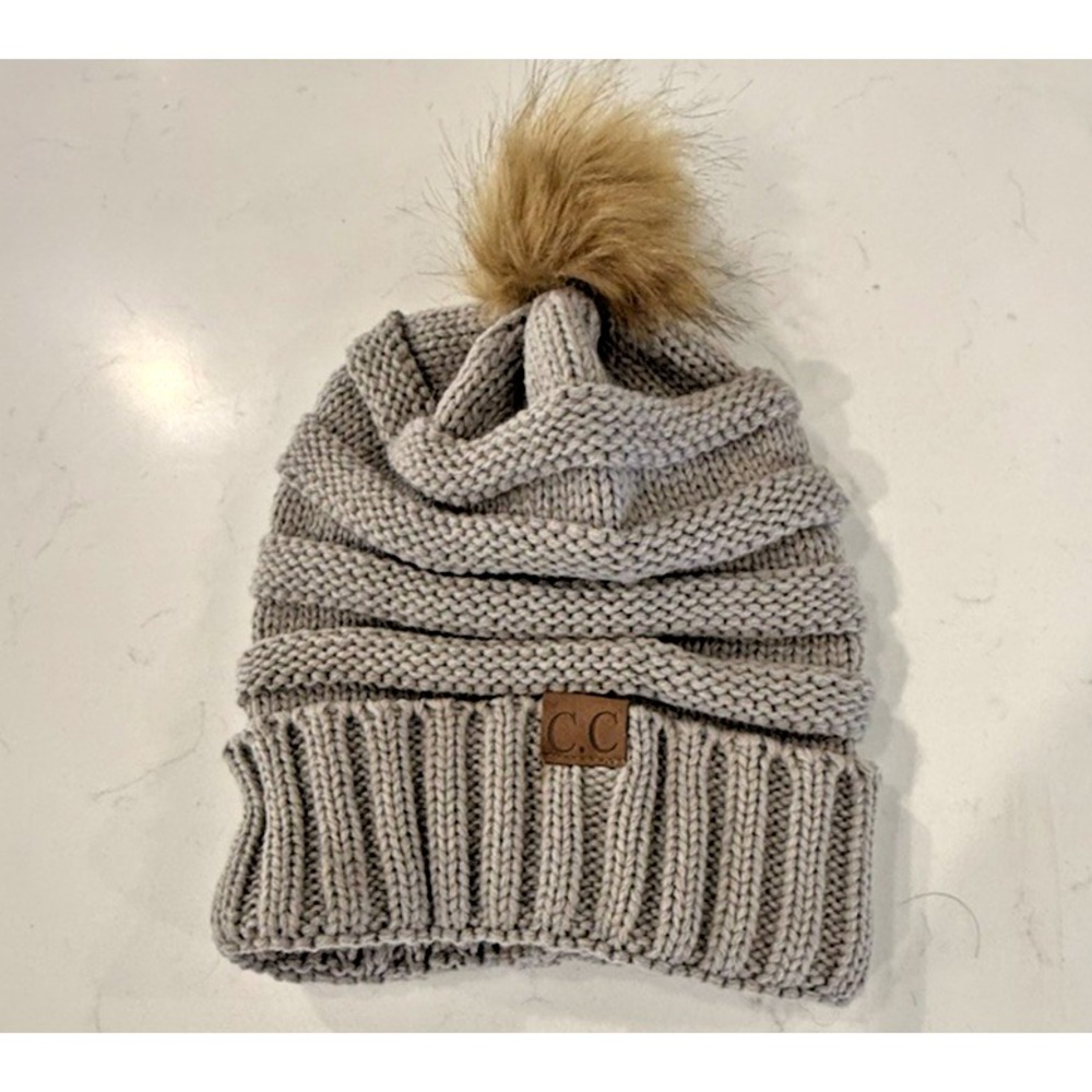CC Exclusives Womens Gray Knit Hat With Large Tan Pom Textured Leather Logo fold